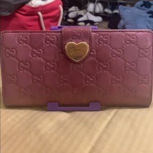 shiny colored pink Gucci wallet